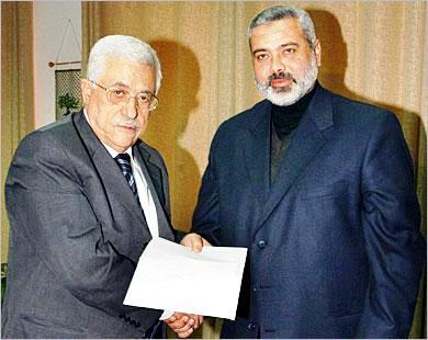 الرئيس الفلسطيني عباس ابو مازن ورئيس الوزراء إسماعيل هنية