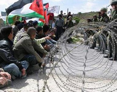 فلسطينيون وأجانب للتضامن ضد جدار الفصل العنصري