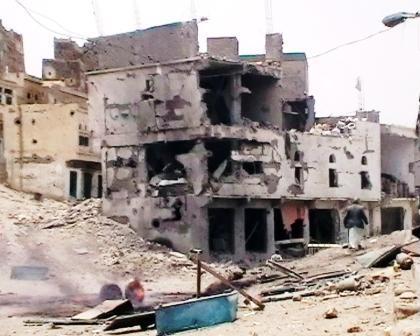 من آثار عدوان المتمردين في صعدة على المنازل والمصالح الحكومية