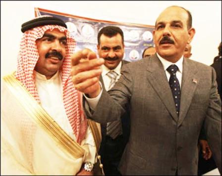 وزير الداخلية العراقي جواد البولاني (يمين)