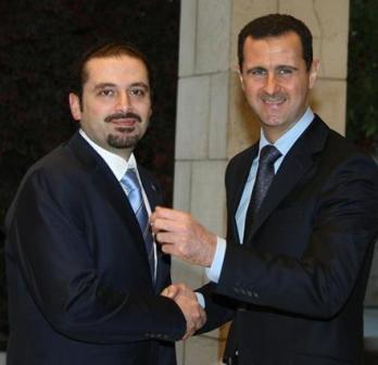 الرئيس السوري بشار الأسد يرحب برئيس الوزراء اللبناني سعد الحريري في دمشق يوم السبت