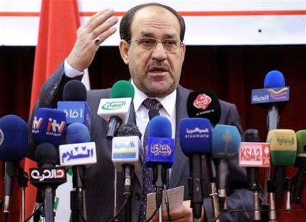 رئيس الوزراء العراقي نوري المالكي أثناء مؤتمر صحفي في بغداد