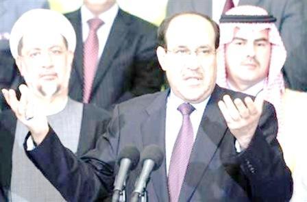 نوري المالكي رئيس الوزراء العراقي يتحدث في مؤتمر صحفي ببغداد يوم 26 مارس 2010.