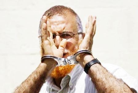 أبو طير أثناء دخوله محكمة في القدس يوم الأول من يوليو .