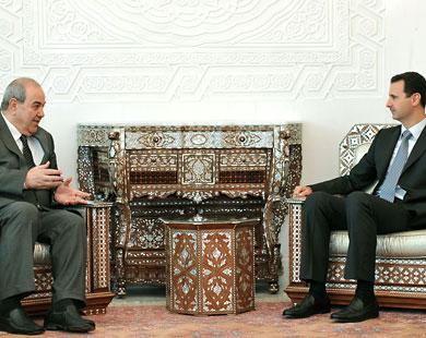 الأسد (يمين) جدد لعلاوي دعمه لأي اتفاق بين العراقيين يدعم وحدة وعروبة العراق