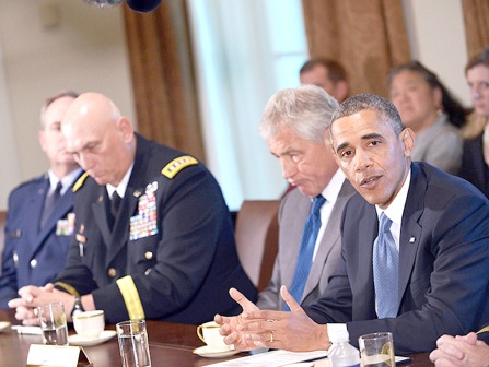 الرئيس الأمريكي خلال اجتماعه مع فريقه لشؤون الأمن القومي