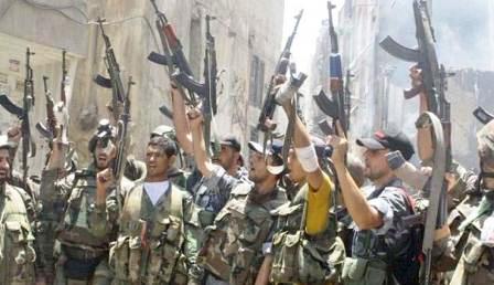 الجيش السوري يحتفل بعد احباط محاولة تسلل لمسلحي جبهة النصرة في حي الرشدية بدير الزور