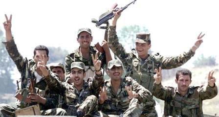 وحدات من الجيش السوري خلال دك تجمعات للإرهابيين في قرى وبلدات بريف دمشق