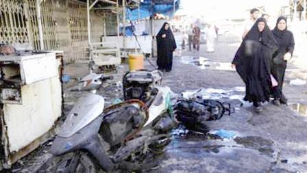 آثار من التفجير الانتحاري الذي استهدف جنازة أحد قادة الصحوة